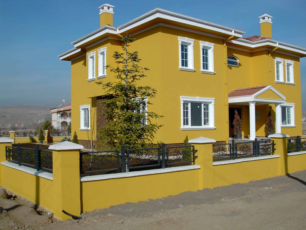 Amazing Bright Yellow Color For Exterior Home Paint Scheme With Small Garden Plant Grass White Window Porch Fence And Several Ideas For Home  Exterior Design