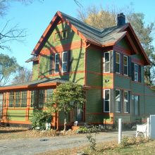 Exterior Design Thumbnail size Amazing COlor Combination Green And Orange For Traditional Home Design With Small Window Rooftop Best Porch White Fence Grass Plant On Garden Home Style Ideas