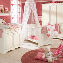 Bedroom Thumbnail size Amazing White Set Baby Bedroom Design Furniture With Pink Wall PaintWhite CurtainLong WindowPictureAccessoriesPillowSimple Baby Nursery Chest Of Drawer White WardrobeFur RugClothes And White Stained Floor