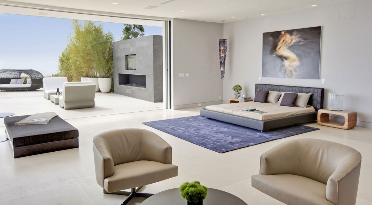 Big Space Bedroom With Nice Outdoor ViewSofaTableVasGreen PlantWall PaintLightingPillowAmazing Bed With Dark Rug And White Floor Concept Bedroom
