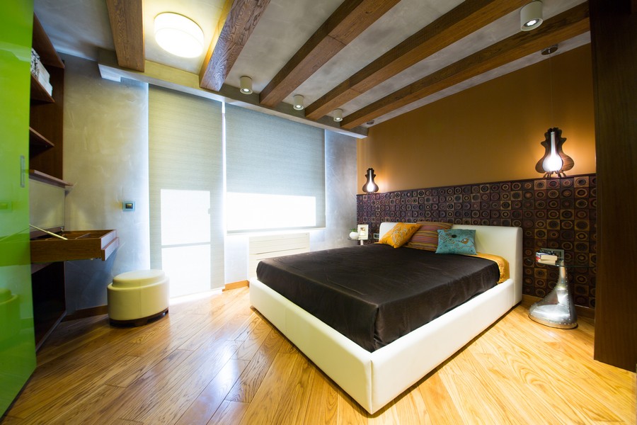Design Modern Bedroom Design Ideas With Cozy Bed With Modern Headboard Brown Bed Covers Pillow Round Glass Table Glass Shelf Yellow Wall Unique Lamp Wooden Flooring  Bedroom