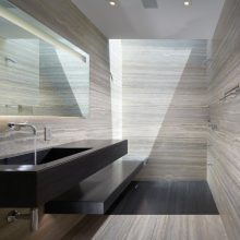 Bathroom Thumbnail size Grey Bathroom Design And Stainless Steel Faucet And Long Frameless Mirror With Black Bathroom Countertop For Bathroom Interior Design Ideas And Floor And Brown Wall Design
