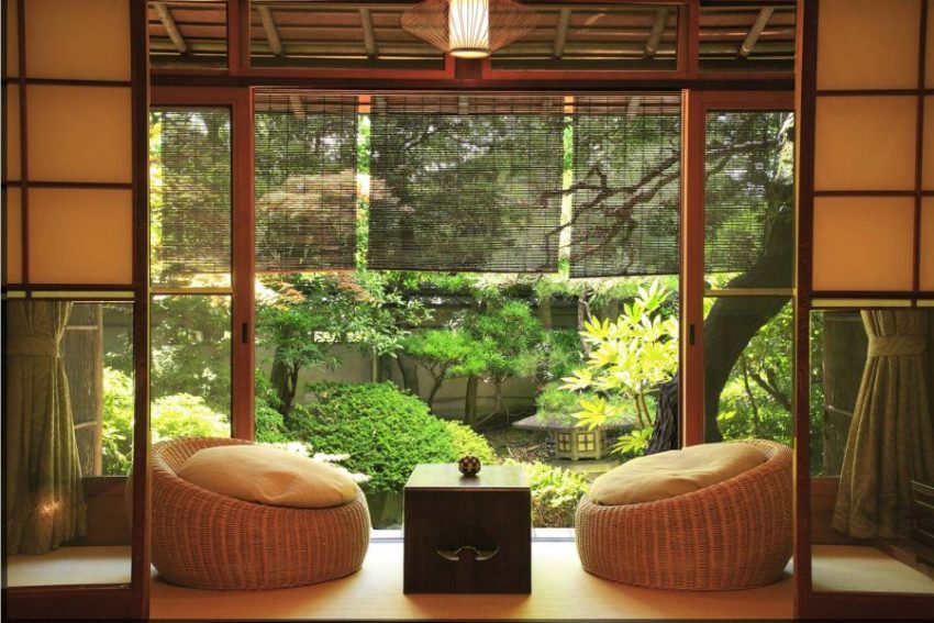Garden Medium size Japanese Style Ethnic Ideas With Nature Inside Home Yard Garden Insipiring With Cute Sofa From Rattan Small Varnished Wooden Table Green Planting And Best Fence For Inside Home Garden Decor
