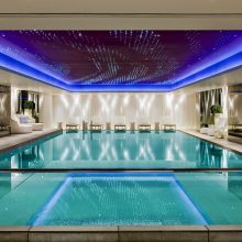 Pool Design Thumbnail size Luxury Indoor Swimming Pool Design Interior With Pure Water Modern White Comfy Beach Awesome Lighting Several Plant Accessories Sitting Space And Amazing Ceiling Ideas