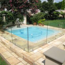 Pool Design Thumbnail size Marvelous Backyard With Glass Fence Swimming Pool Ideas Simple Shape Block Floortile Design Flower Growth Green Plant And Grass For Exterior Pool Design