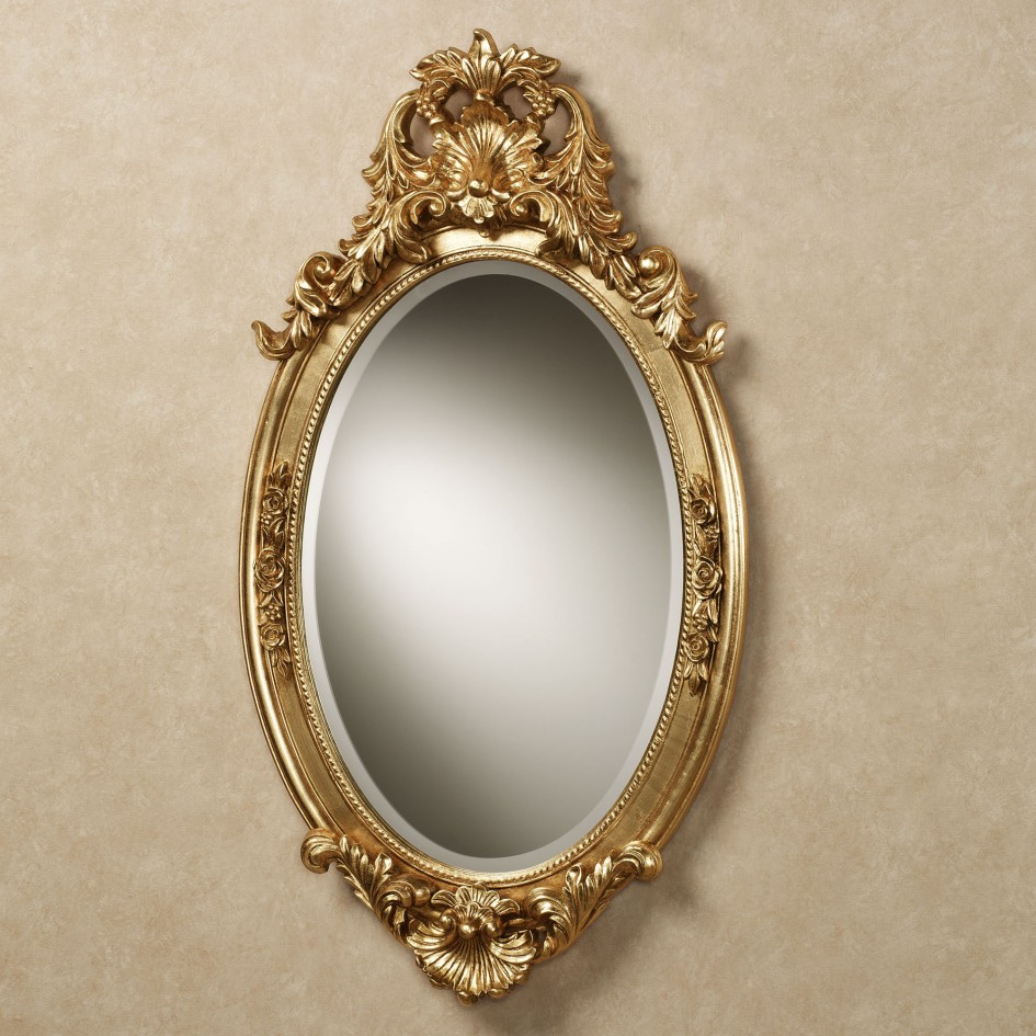 Mesmerizing Oval Bathroom Mirror Designed In Shining Shape With Luxurious Carvings In Gold Color Around Its Edge Bathroom