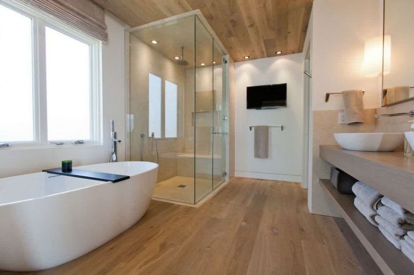 Bathroom Modern Bathroom Ideas With White Bath TubWooden Laminated Floor Wooden Ceiling Simple Lighting With Two Window Glass Door Bath Tv Screen And Storage Contemporary Bathroom Design with Modern Relaxing Space