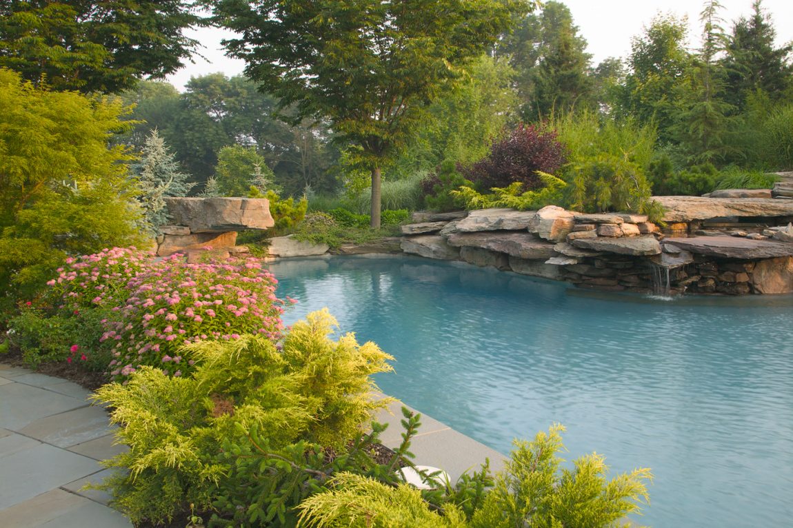 Pool Design Large-size Natural Swimming Pool Ideas With Fresh Concept Design Exterior Flower Green Plant Trees Natural Stone Ideas Pure Water For Feel Amazing Swimming Pool Design