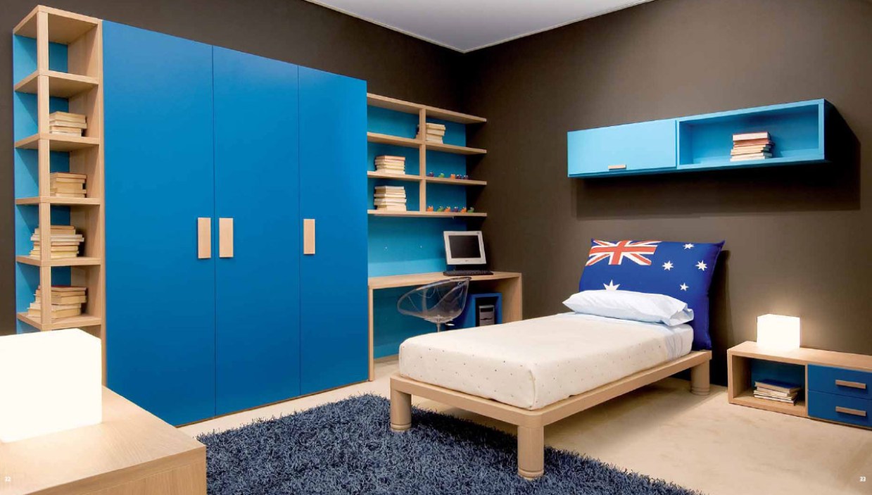 Room Interior Design For Small Bedroom With Blue Furniture Concept Wooden Varnished Bedroom With Pillow Large Cupboard StorageBookComputerUnique ChairMini DeskFloor With Fur RugGray Wall And Box Lamp Bedroom