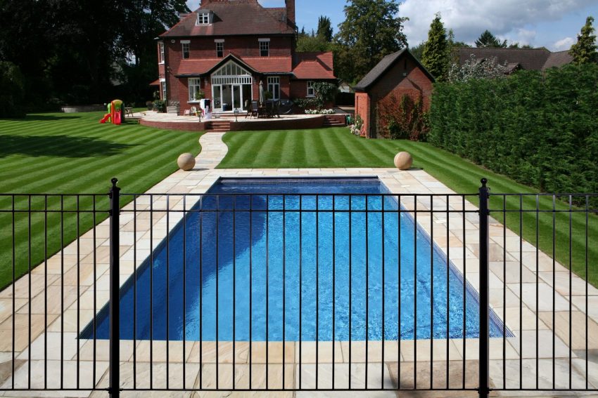 Pool Design Medium size Royal Swimming Pool Design Ideas With ELegance Shape Amazing Fence Block Floortile Green Plant Grass Desig Exterior Home For Modern Concept Exterior Pool Ideas