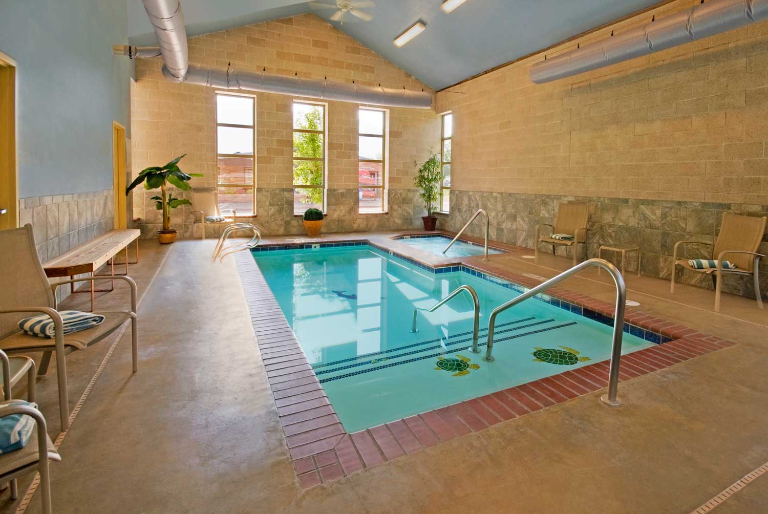 Small Indoor Swimming Pool Design Ideas With Pure Water Best Tile Sitting Space Gray Ceiling Best Wall And Long Window  Pool Design