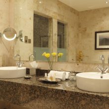 Bathroom Thumbnail size Classy Double White Round Bowl Sink On Brown Granite Countertop Mirror Vanities In Luxurious Venetian Hotel Bathroom Schemes Soothing Hotel Bathroom Scheme Furniture As Well As Picture
