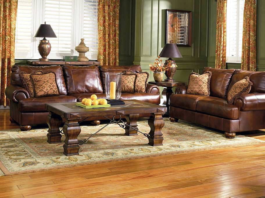 Decorations Interior Apartment Living Room And Wooden Flooring Design And Solid Wood Coffee Table With Vintage Brown Leather Sofa And Vintage Area Rugs For Small Living With Carving On The Legs Living Room