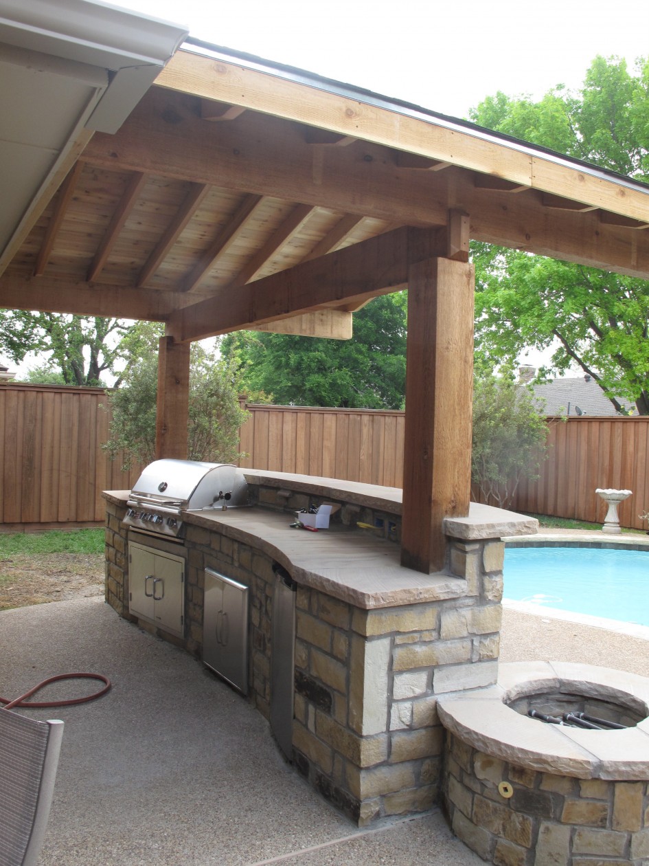 Modern Bull Outdoor Gourmet Q Grilling Island Escorted By Built In Grill Escorted By Outdoor Blue Pool As Decor Outside Kitchen Escorted By Wooden Fenc Inspiration Kitchen Wonderful Wooden Kitchen
