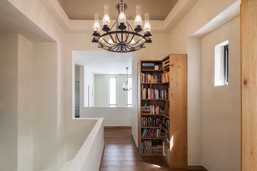 Architecture Medium size Luxurious Blossom Chandelier Design Loping On Modern Ceiling Facing Wooden Floor And Bookshelves