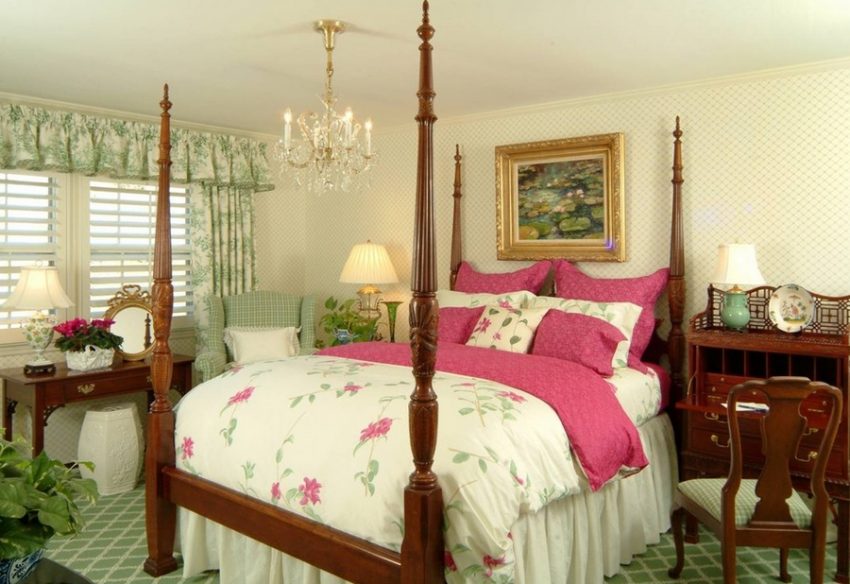 Bedroom Beautiful Pink Canopy Bed Flashing Floral Blanket Upon Green Patterned Area Rug Aside Wooden Vanity Design Lovable Bedroom Designs that Exude Feminine Character