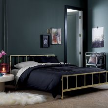 Bedroom Thumbnail size Black Bedding Set With Metal Frame Upon White Furry Rug Surrounded Dark Backdrop