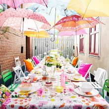 Ideas Thumbnail size Cheerful Breakfast Table With Floral Cloth Beneath Colorful Umbrellas Surrounded With Stunning Chair Designs