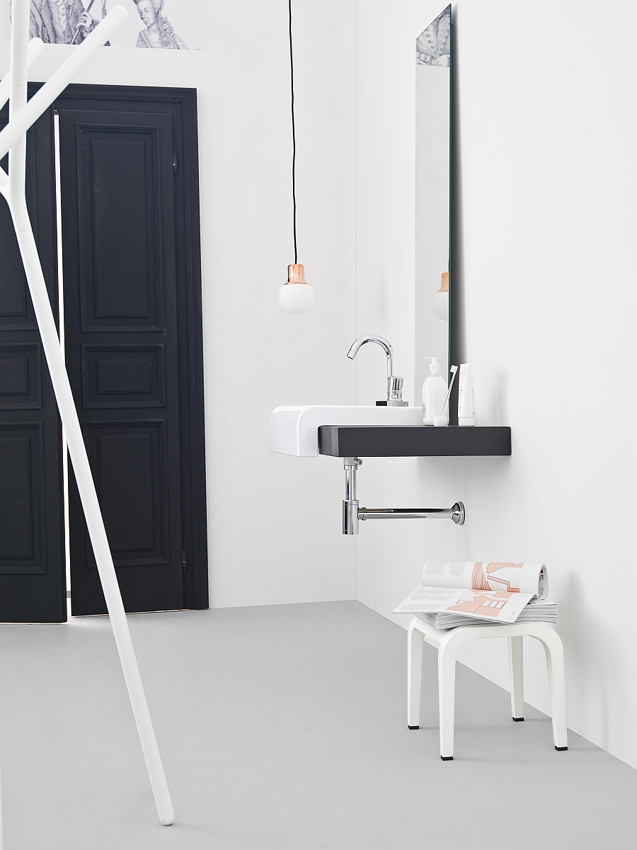 Exclusive Spacious Powder Room With Simple Floating Vanity In White Black Combination And Small Chair Storage Bathroom