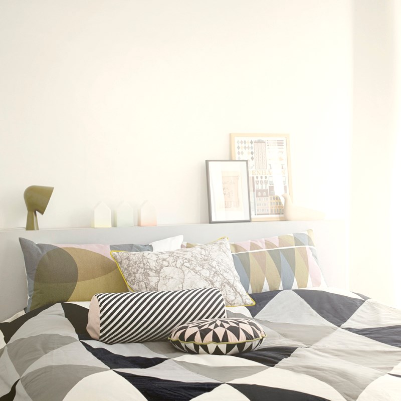 Geometrical Themed Bedroom With Black White Bedcover And Stripe Patterned Pillow Flashed With Evening Hue Pantone Bedroom