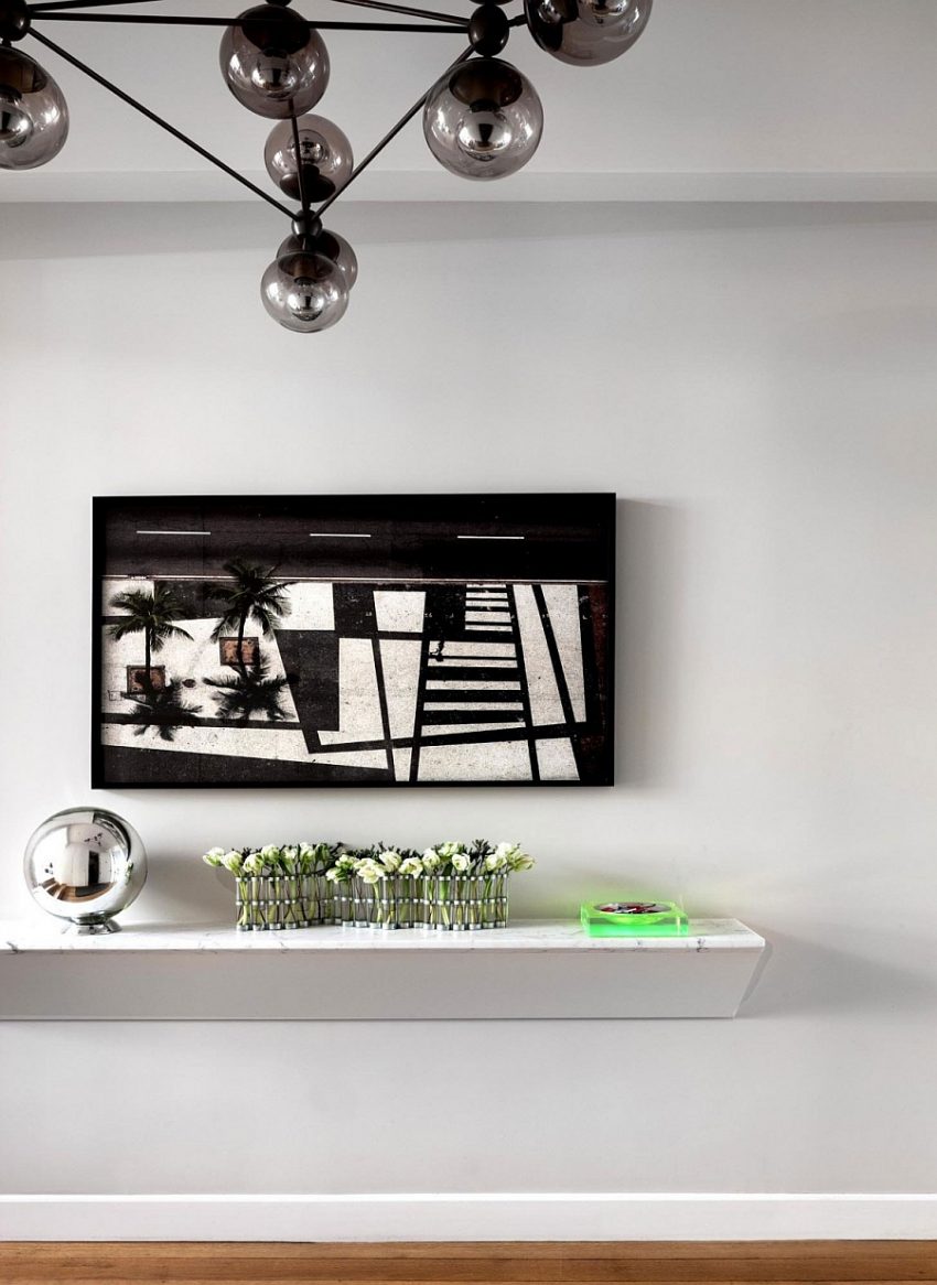 Apartment Gorgeous White Light Wall Rack Unit With Small Decorative Plants Aside Stain Ball Beneath TV Set Manhattan Apartment Showcases Interior Flashed with Dazzling Flair of Rio
