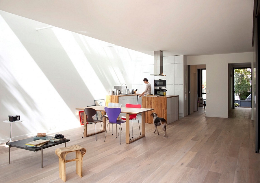 Great Minimalist Open Kitchen Dining Room With Colorful Table Set Facing Island Bar Upon Wooden Floor Interior Design