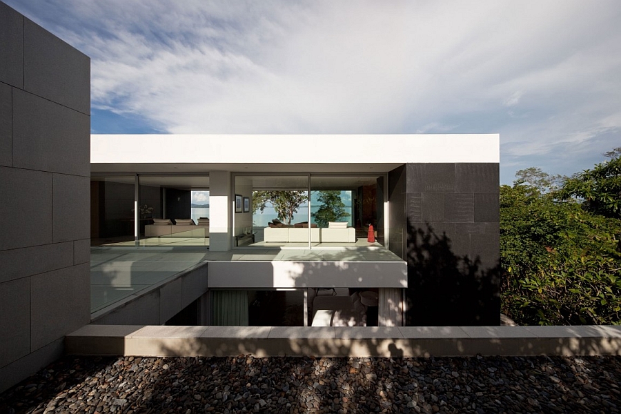 Great Rooftop Concrete Design Overlooking Surrounding With Big Tree In Black White Combination Villa & Resort