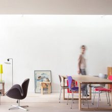 Interior Design Mesmerizing Black Relaxing Chair Aside Floor Lamp Upon Wooden Floor Below Framed Large Window Design Amazing Eco Friendly Prefabricated Modular House in Paris