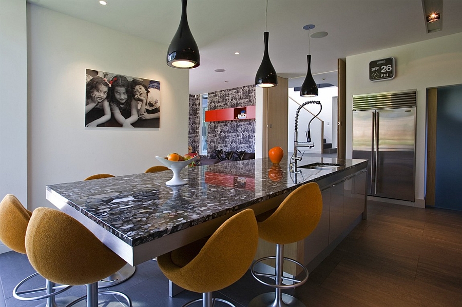 Posh Dining Table With Marble Countertop And Orange Modern Stools Beneath Contemporary Black Pendants Interior Design