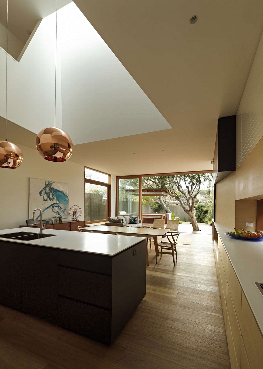 Royal Modern Golden Ball Pendant Lamps Above Kitchen Island Confronting Bright Skylight Ideas