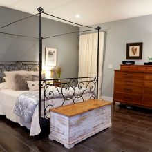 Bedroom Dazzling Modern Feminine Bedroom With Black Tufted Headboard Covered With White Blanket Beneath Abstract Painting Lovable Bedroom Designs that Exude Feminine Character