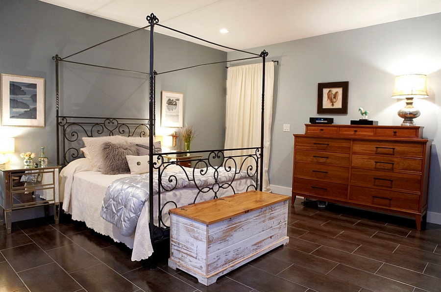 Spacious Bedroom With Canopy Bed Facing Wooden Bench Upon Tiles Flooring Style Featuring Drawers Bedroom