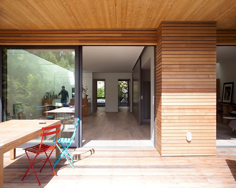 Terrace Family Hub With Blue Red Chair Design Facing Wooden Table Flashed With Deck Walling Idea Interior Design