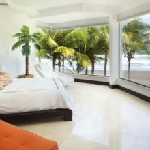 Bedroom Big Glass Windows Orange Chair White Bed Cover White Big Chair Big-glass-window-Black-rugs-Plain-white-bed-cover-Modern-style-bed
