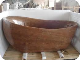 Brown Natural Stone Bathtubs Combining Comfort Bathroom