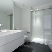 Bathroom Black Floor Large Mirror White Toilet 915x607 white-ceiling-stell-faucet-white-towel