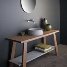 Bathroom Grey Marble Sink Grey Wall Small Round Mirror Wooden Table stone-floor-white-wall-white-bathtub