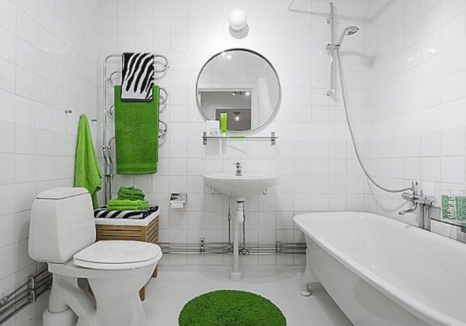 Bathroom White Bathtub White Toilet White Wall Round Mirror Green Towel 915x640 Minimalist Light Style for Bathroom