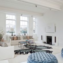 Ideas Blake House Spacious Home Blue Round Sofas Blake-House-animal-print-rug-ideas